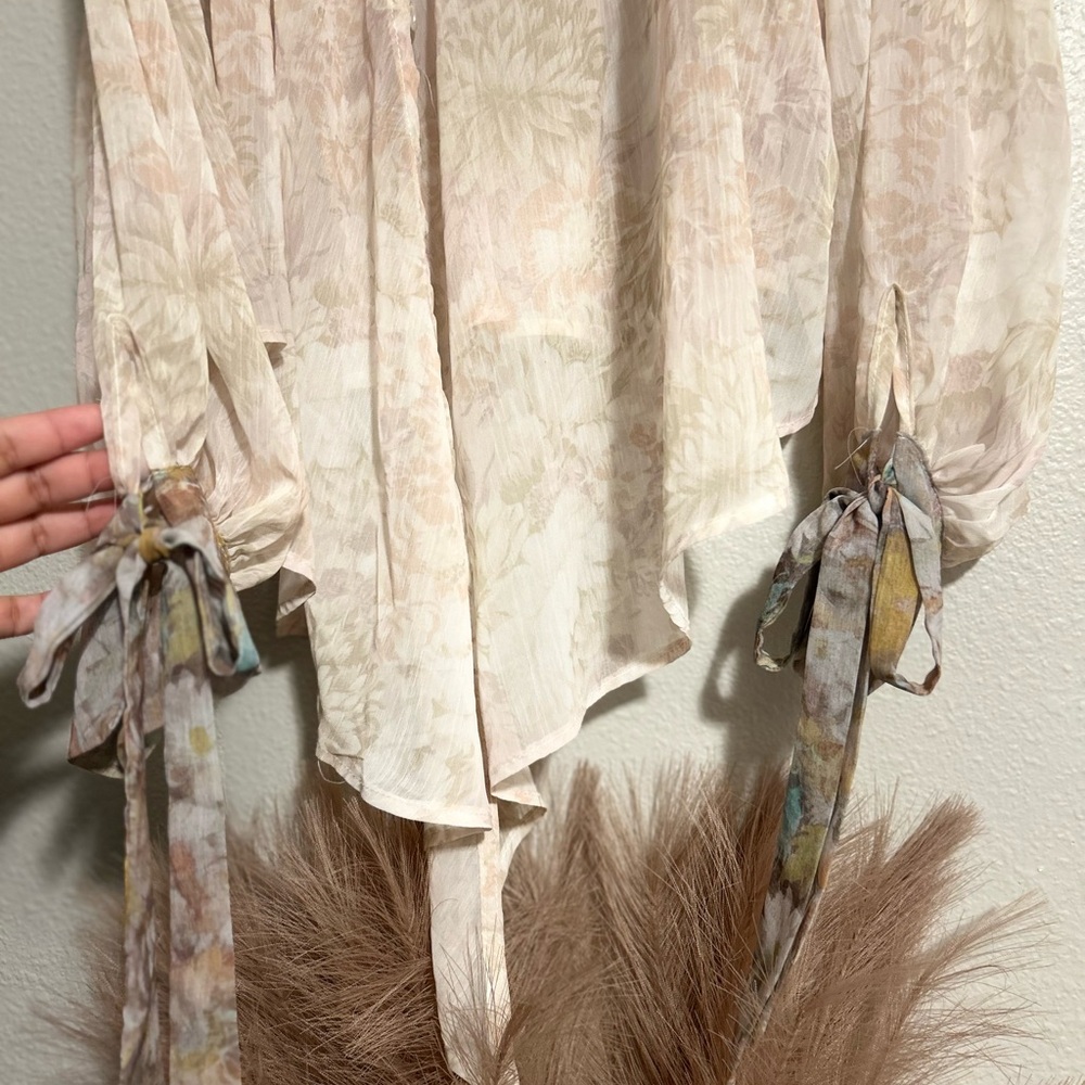 Elegant Cream Blouse with Ruffled Details